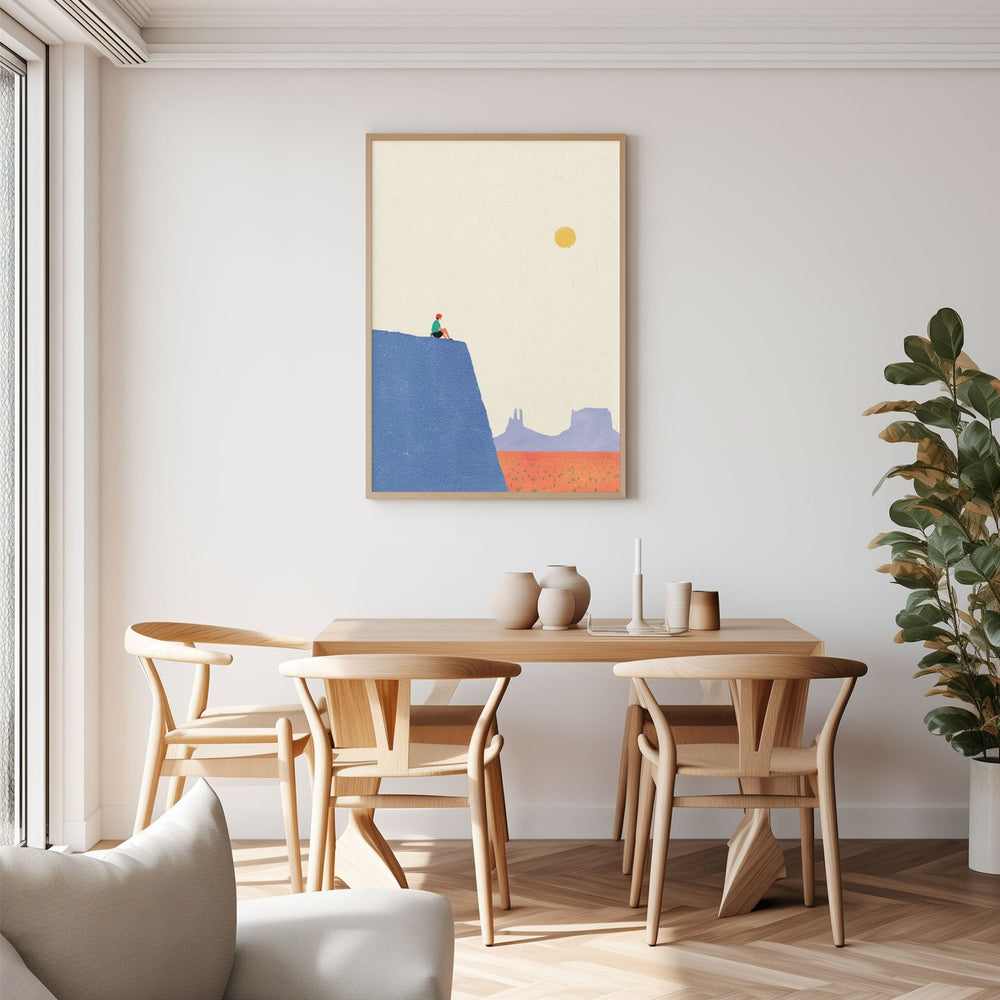 Dining room with wooden table and chairs, abstract art on the wall, and a plant.