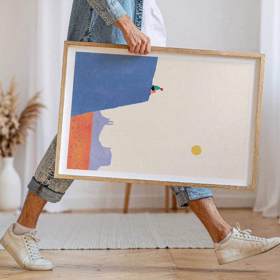 Person holding abstract art piece in a home setting