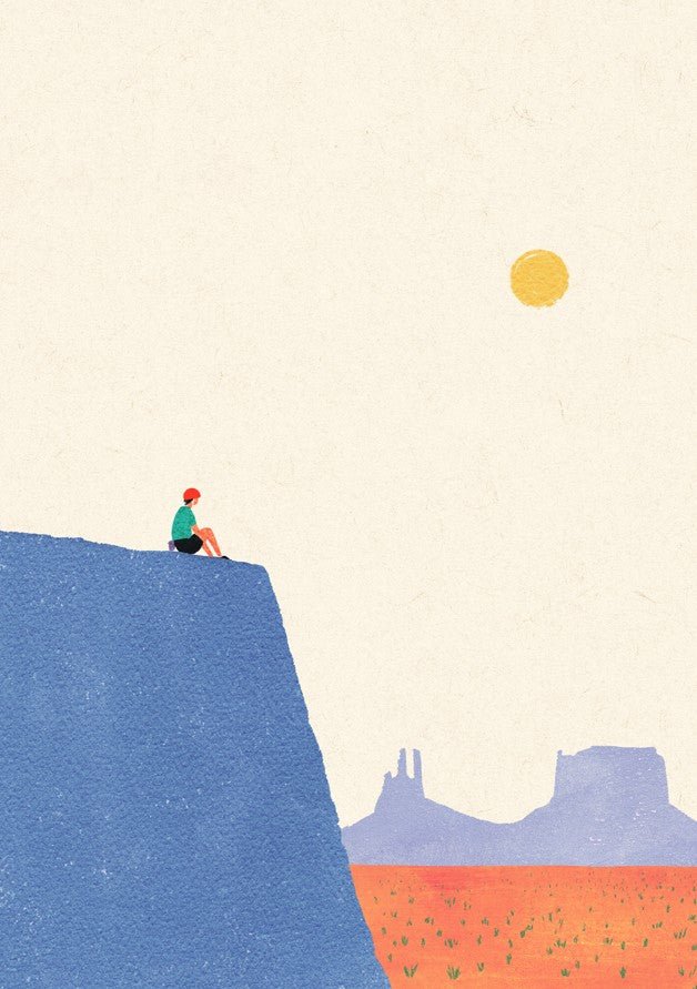 Person sitting on a cliff overlooking a desert landscape with a large sun. framed