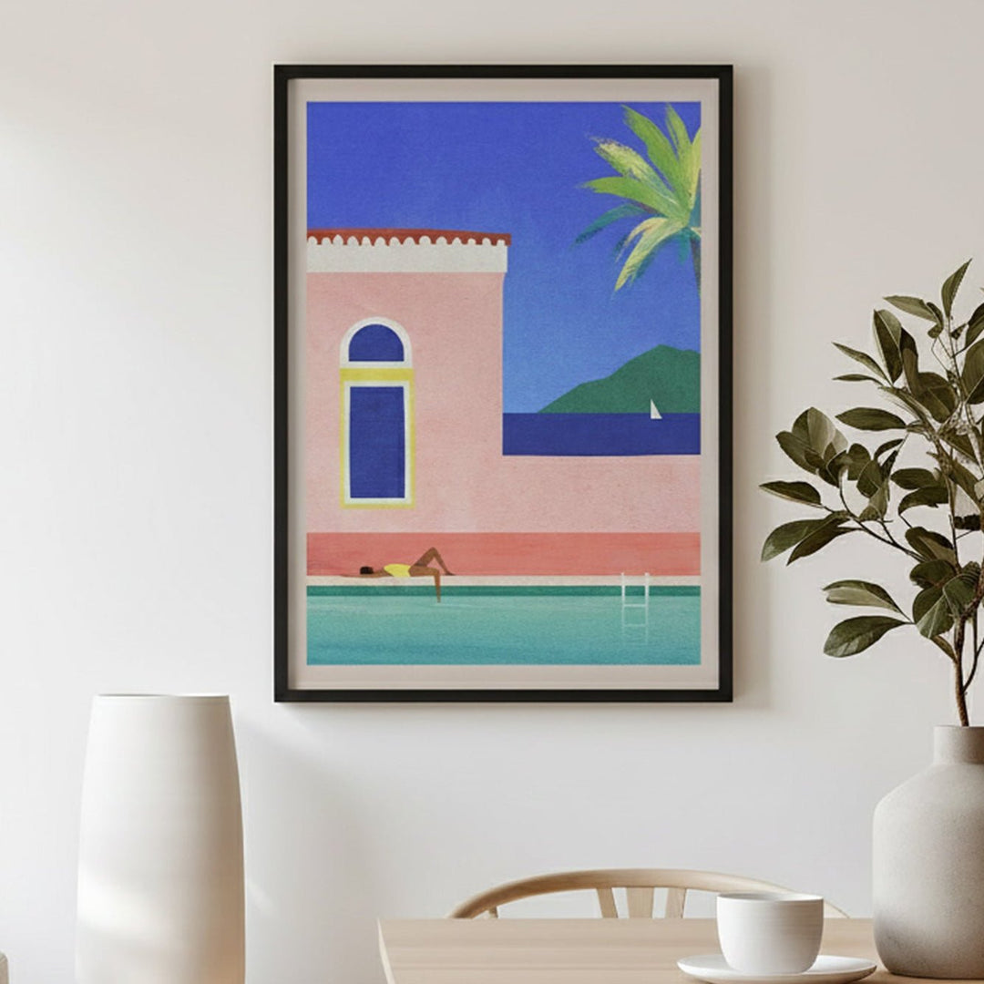 Modern living room with a colorful abstract painting on the wall, a table with a plant, and a couch.