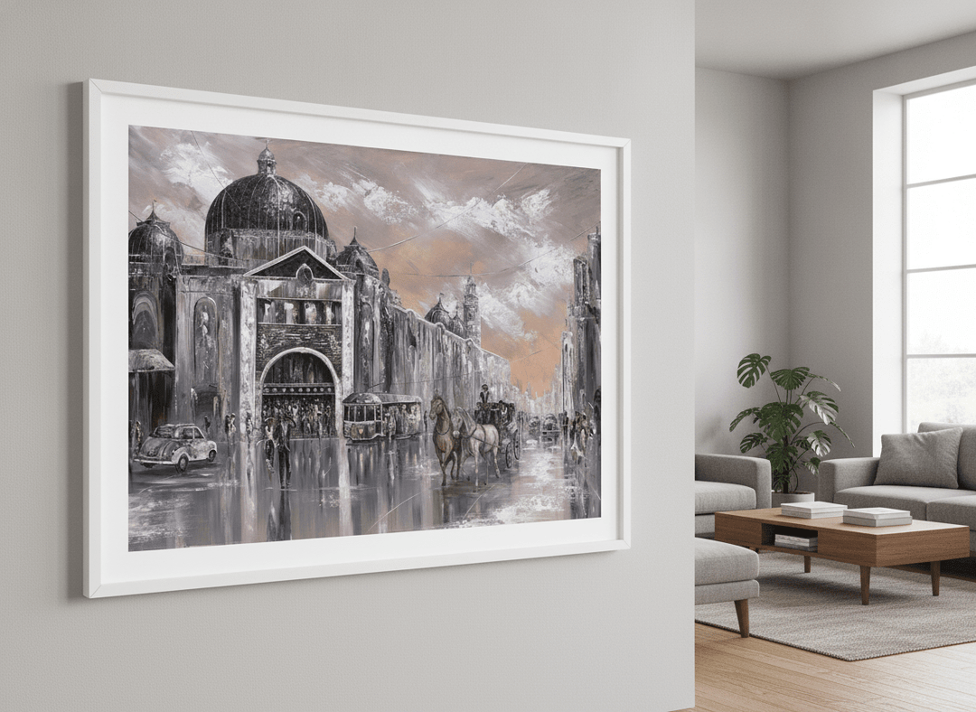 Modern wall art styled above a sofa in a neutral living room