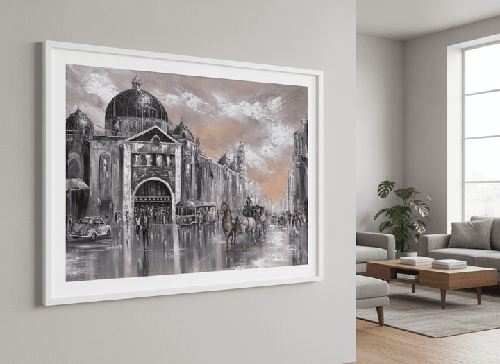 Modern wall art styled above a sofa in a neutral living room