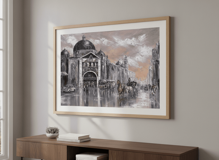 Modern wall art styled above a sofa in a neutral living room