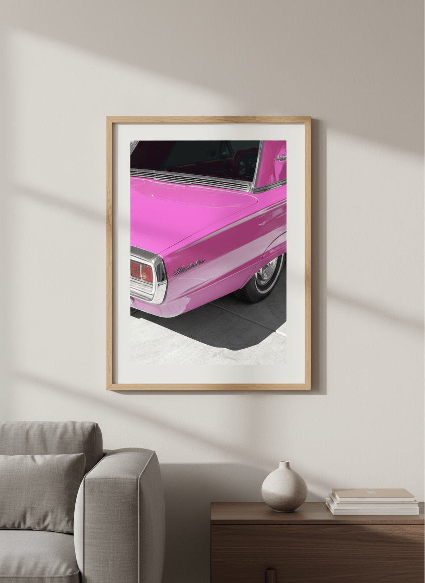 Modern wall art styled above a sofa in a neutral living room