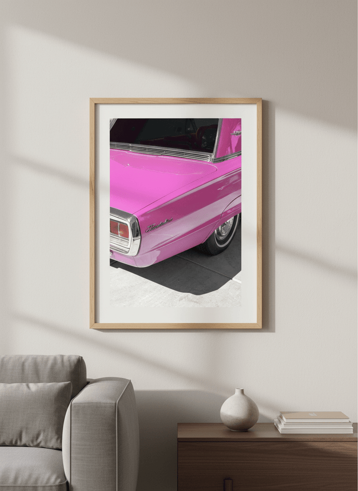 Modern wall art styled above a sofa in a neutral living room
