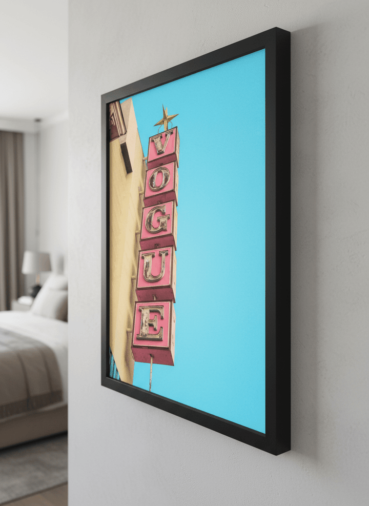 Minimalist artwork displayed in a calm, light-filled bedroom interior