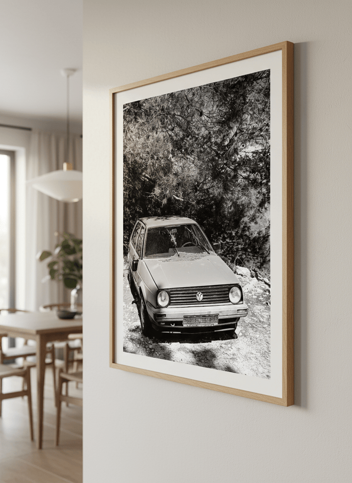 Wall art styled above a dining table in a contemporary home