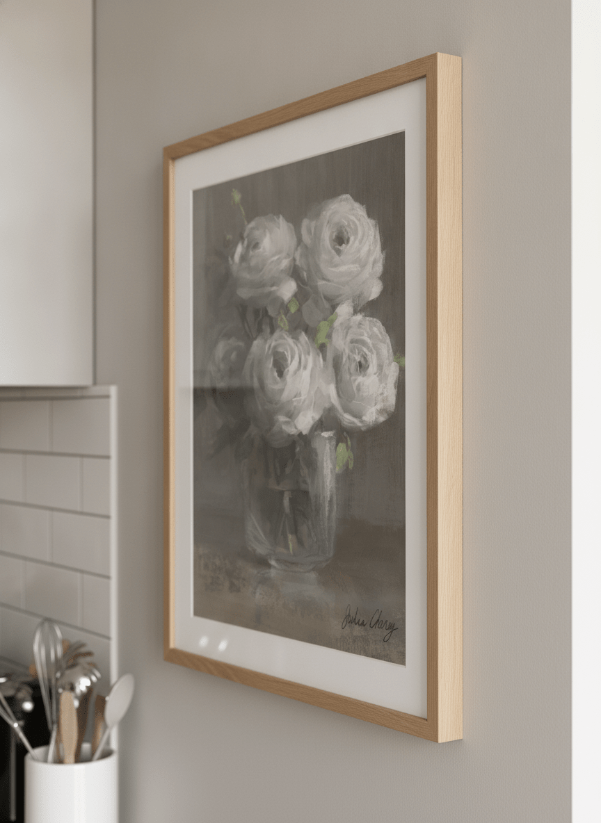 Artwork styled on the wall of a bright modern kitchen