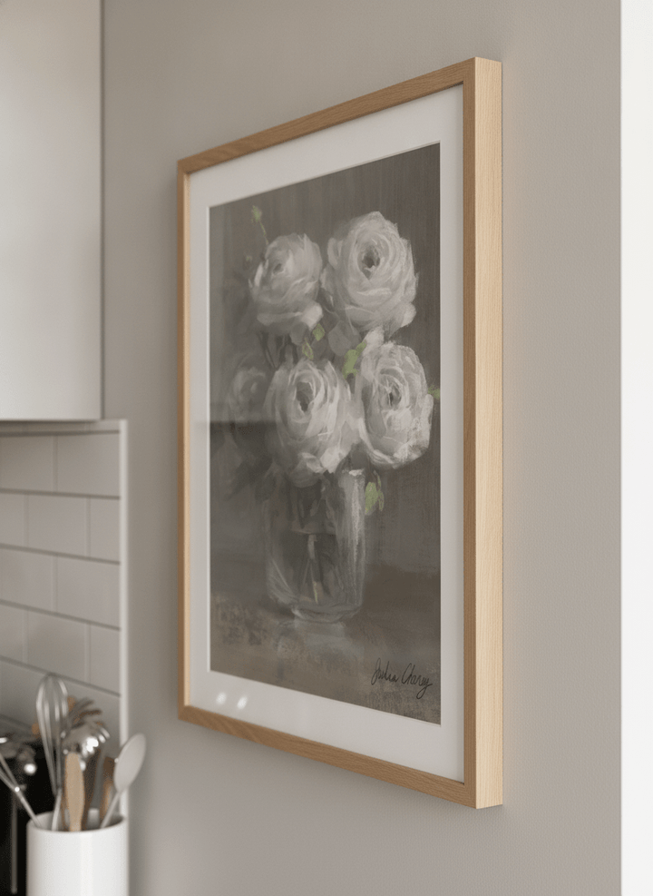 Artwork styled on the wall of a bright modern kitchen