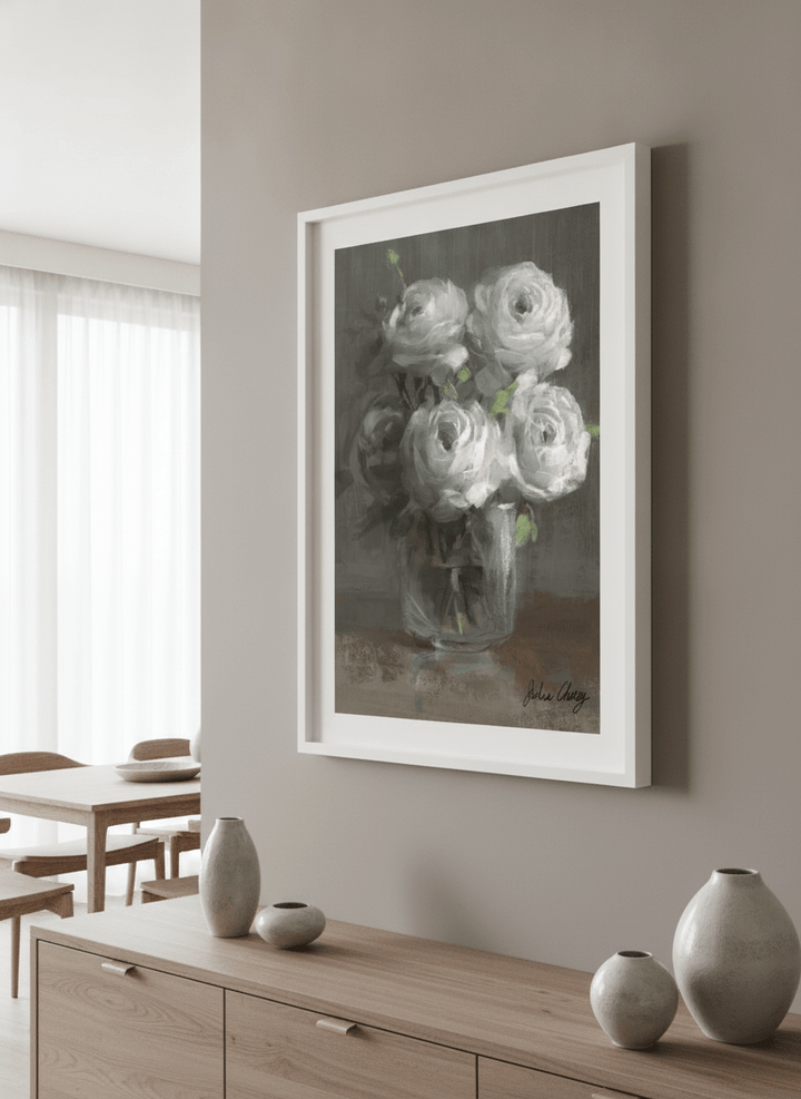 Wall art styled above a dining table in a contemporary home