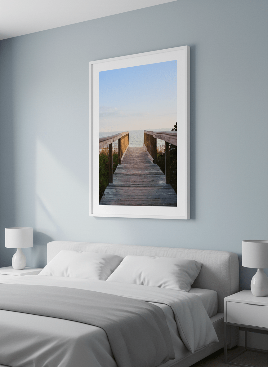 Minimalist artwork displayed in a calm, light-filled bedroom interior