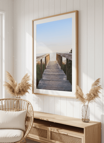 Neutral wall art displayed in a sunny coastal beach house