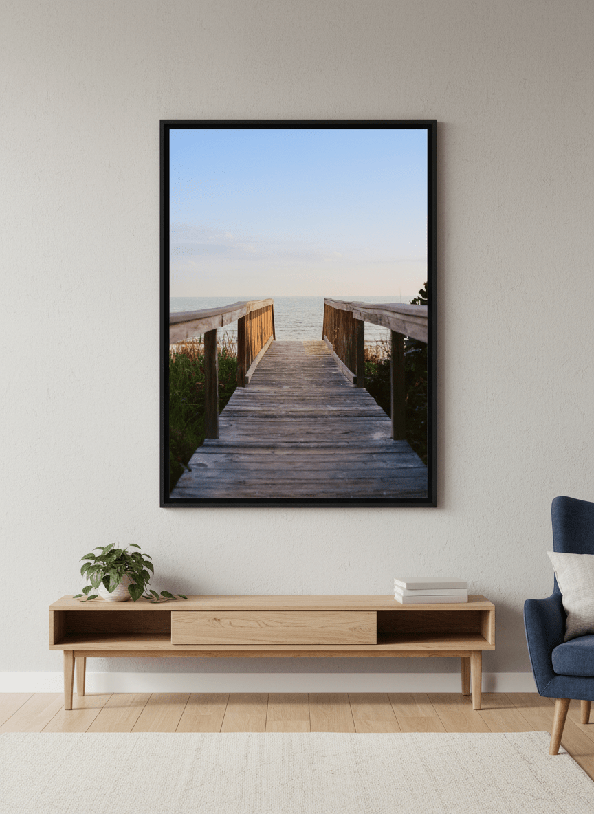 Modern wall art styled above a sofa in a neutral living room