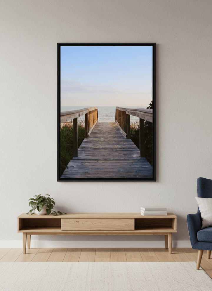 Modern wall art styled above a sofa in a neutral living room