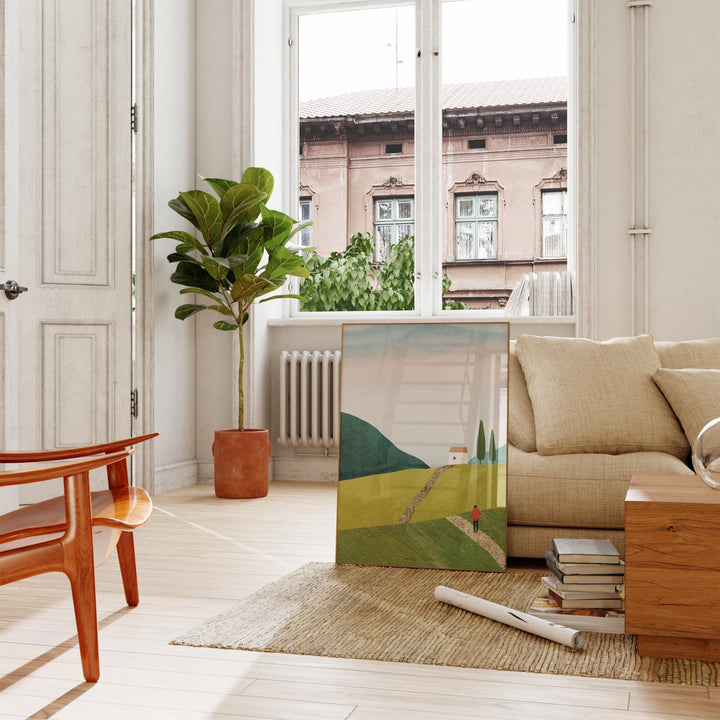Living room with a painting, plant, and furniture