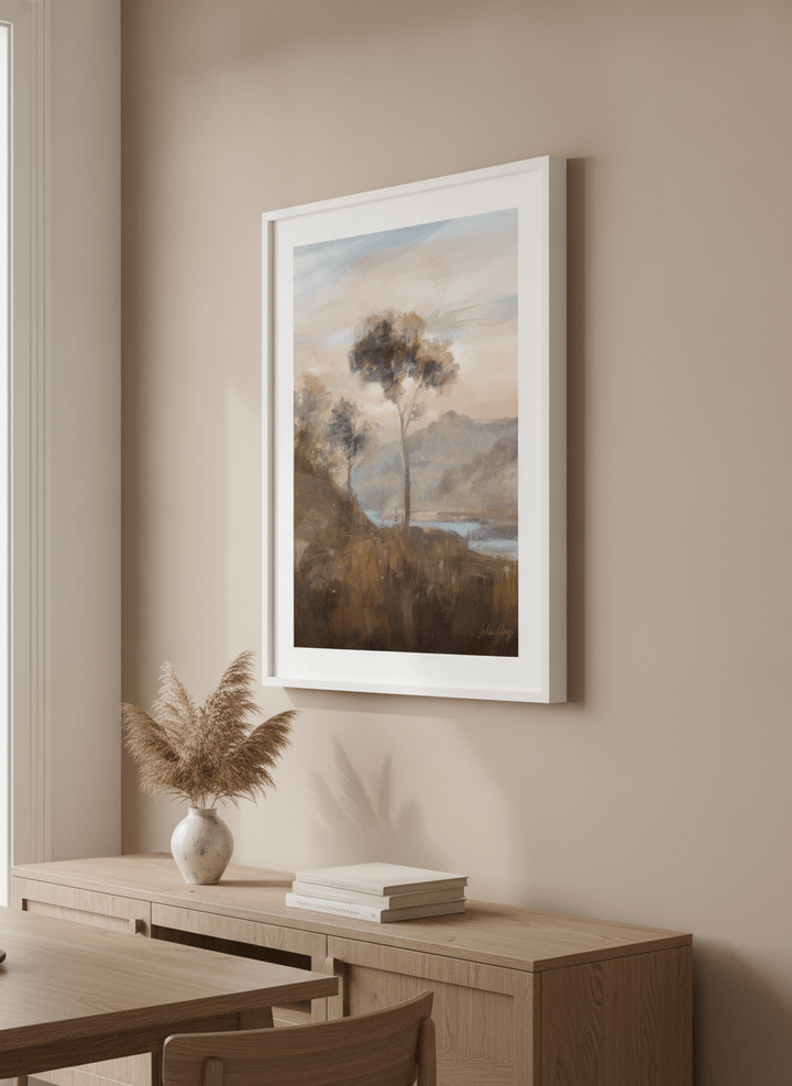 Wall art styled above a dining table in a contemporary home
