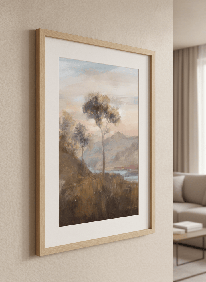 Modern wall art styled above a sofa in a neutral living room