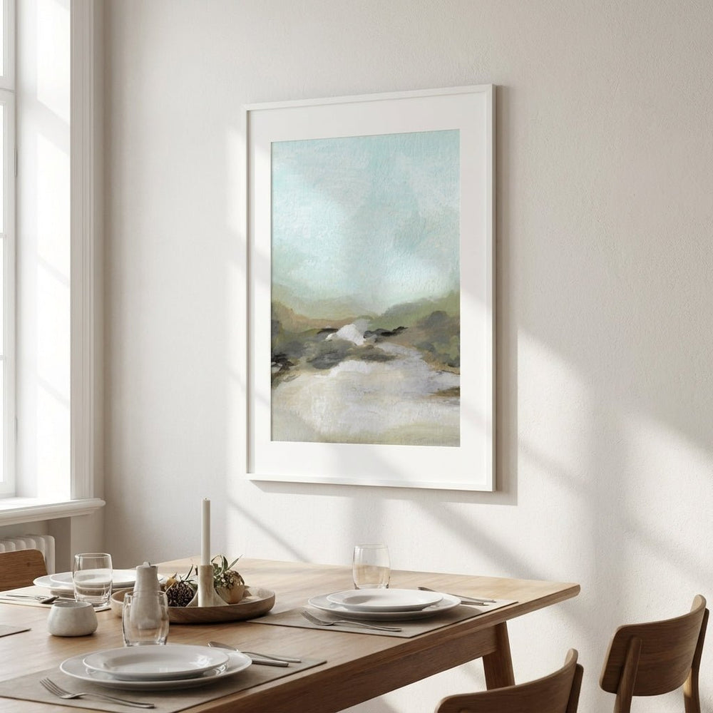 abstract artwork on a wall above a dining table with plates and glasses.