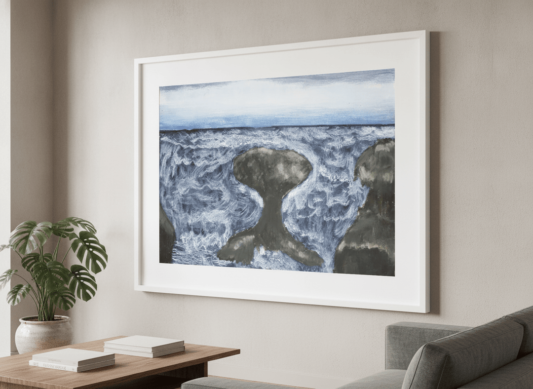 Modern wall art styled above a sofa in a neutral living room