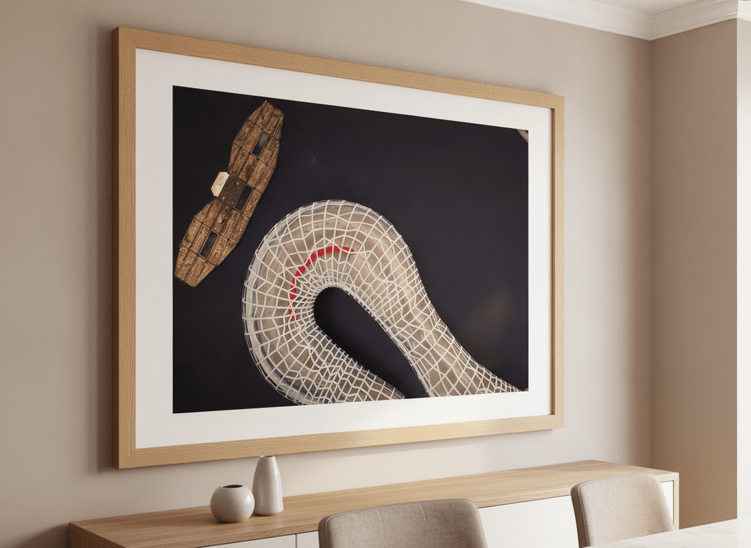 Wall art styled above a dining table in a contemporary home