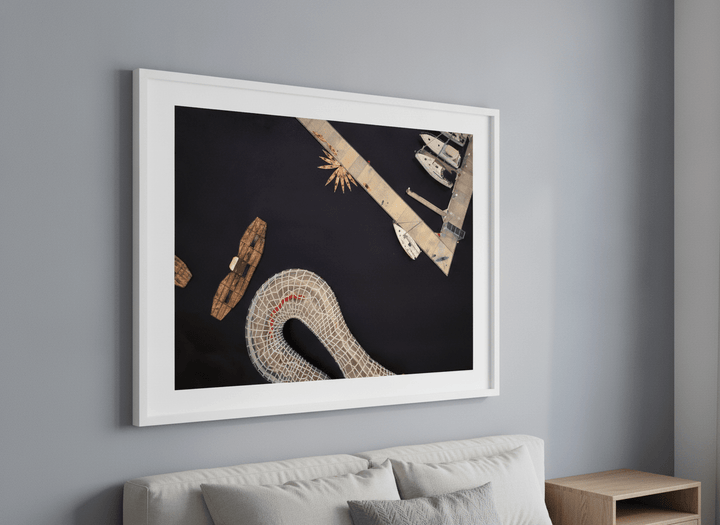 Minimalist artwork displayed in a calm, light-filled bedroom interior
