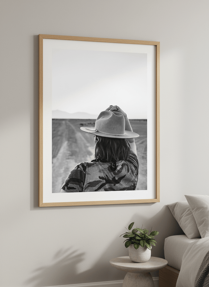 Minimalist artwork displayed in a calm, light-filled bedroom interior