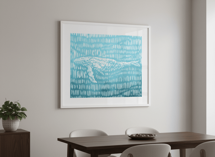 Wall art styled above a dining table in a contemporary home