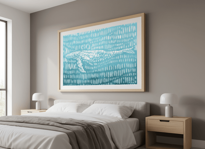 Minimalist artwork displayed in a calm, light-filled bedroom interior
