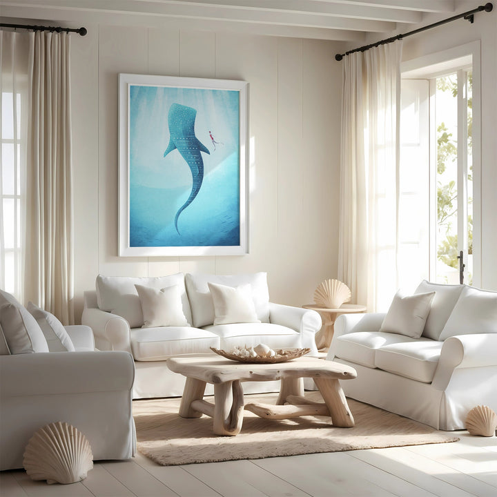 Living room with white furniture, a wooden coffee table, and picture of a whale.