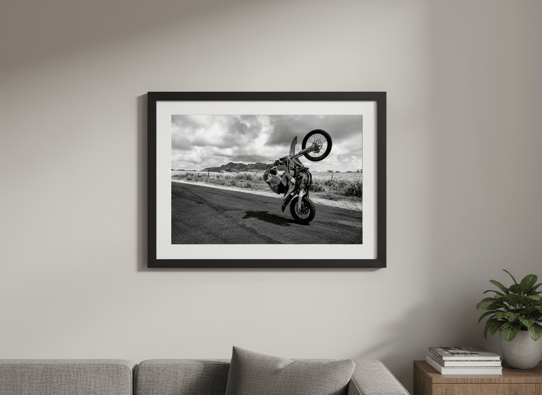 Modern wall art styled above a sofa in a neutral living room