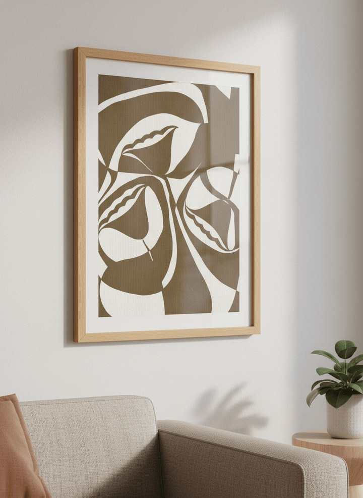Modern wall art styled above a sofa in a neutral living room