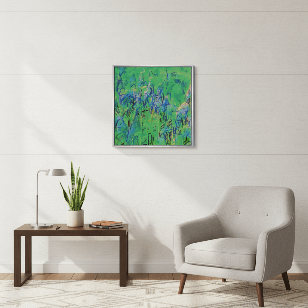 Canvas wall art with a silver leaf surround styled in a bright modern office