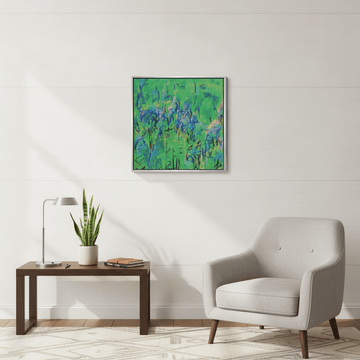 Canvas wall art with a silver leaf surround styled in a bright modern office