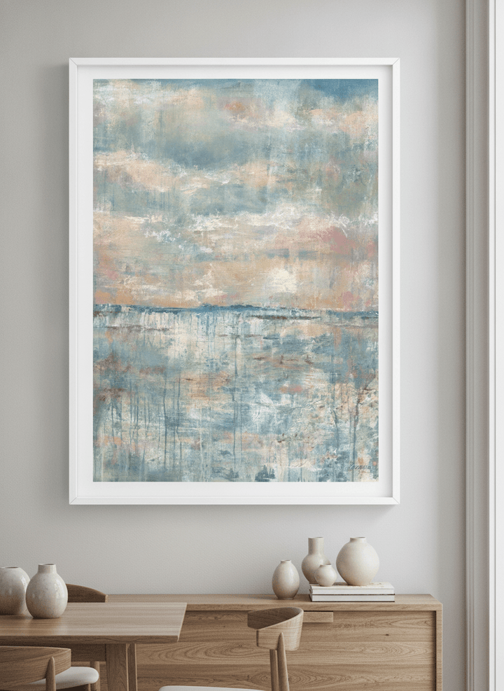Wall art styled above a dining table in a contemporary home