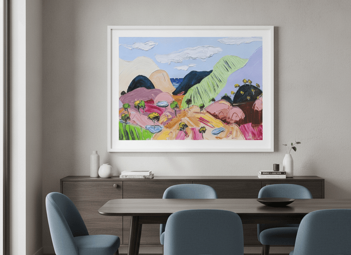 Wall art styled above a dining table in a contemporary home
