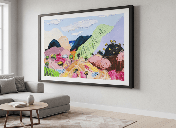 Modern wall art styled above a sofa in a neutral living room