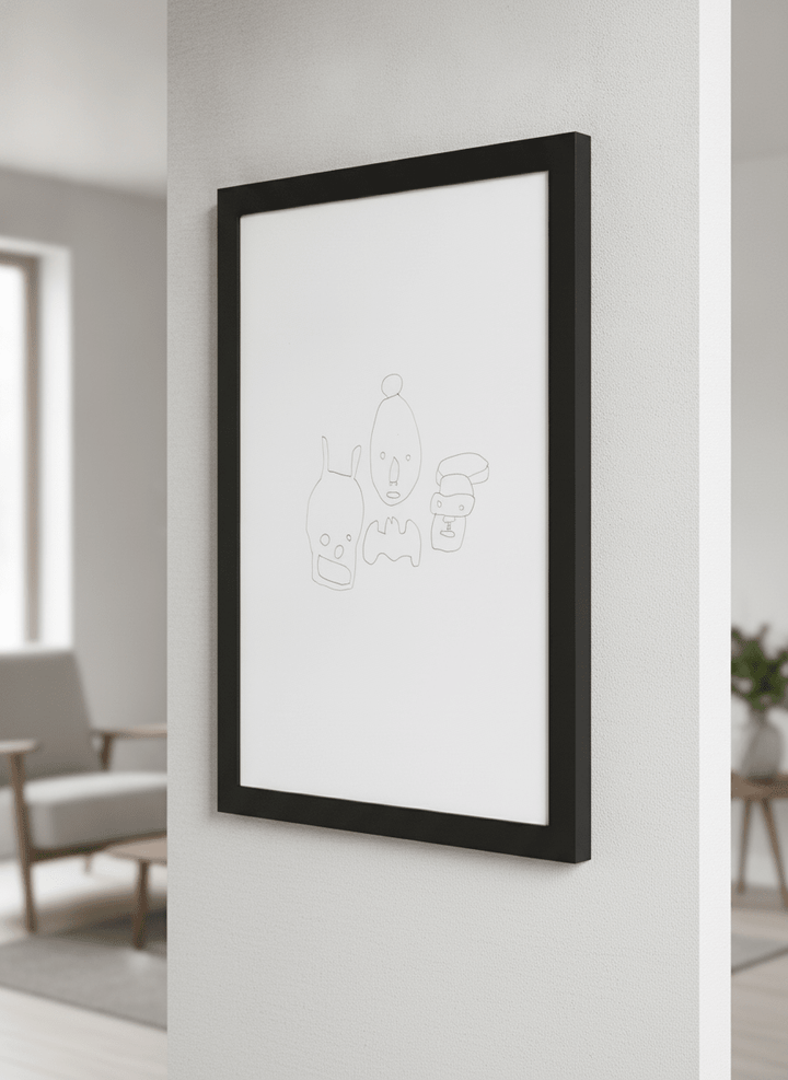 Modern wall art styled above a sofa in a neutral living room