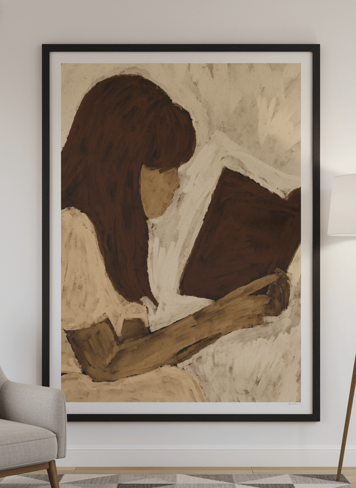 Modern wall art styled above a sofa in a neutral living room