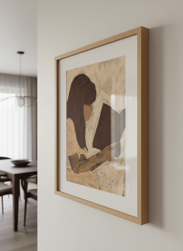 Wall art styled above a dining table in a contemporary home