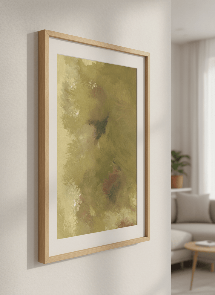 Modern wall art styled above a sofa in a neutral living room