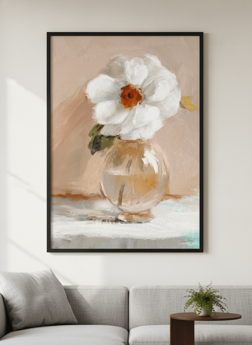 Modern wall art styled above a sofa in a neutral living room