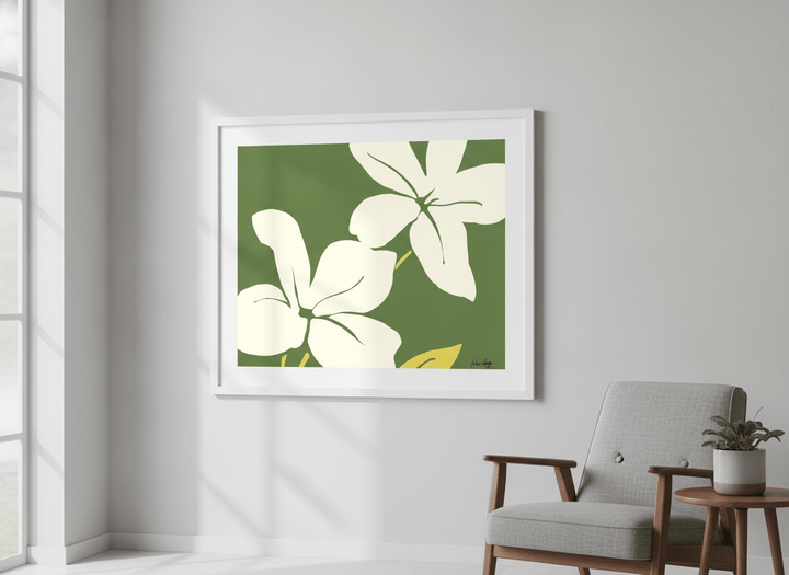 Modern wall art styled above a sofa in a neutral living room