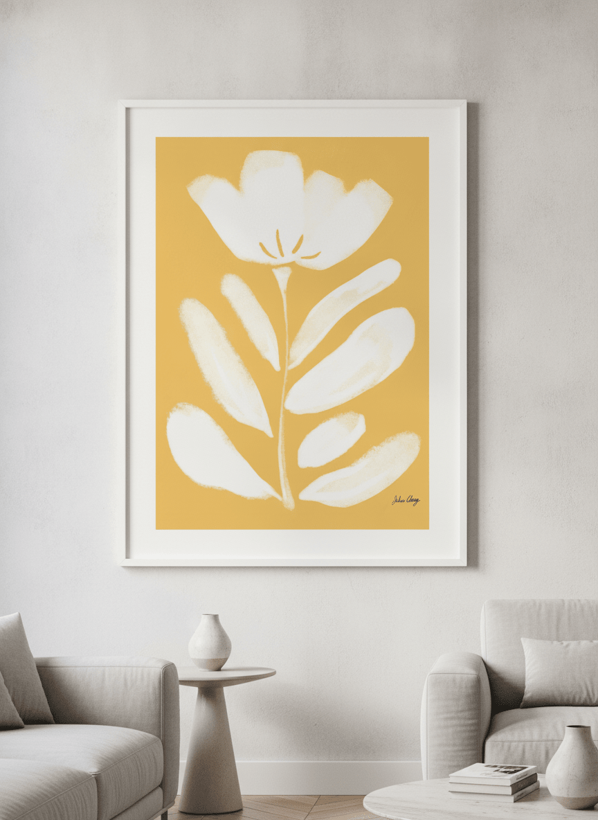 Modern wall art styled above a sofa in a neutral living room