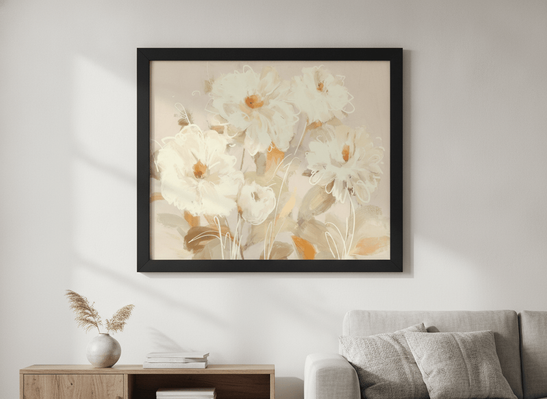 Modern wall art styled above a sofa in a neutral living room