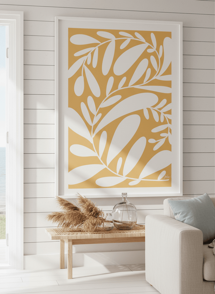 Neutral wall art displayed in a sunny coastal beach house