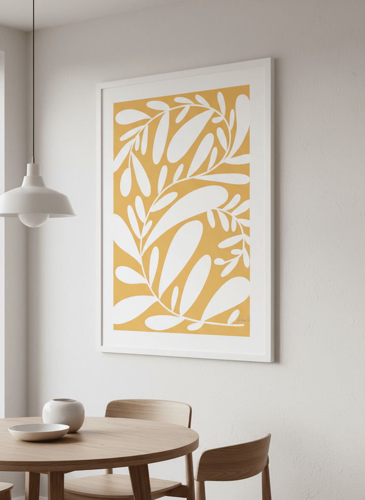 Wall art styled above a dining table in a contemporary home