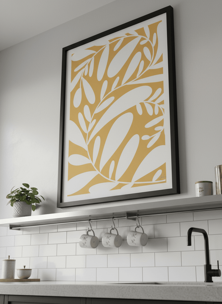 Artwork styled on the wall of a bright modern kitchen