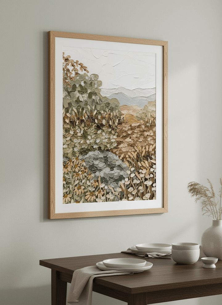 Wall art styled above a dining table in a contemporary home