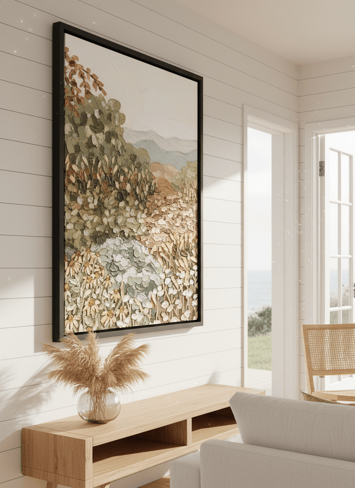 Neutral wall art displayed in a sunny coastal beach house
