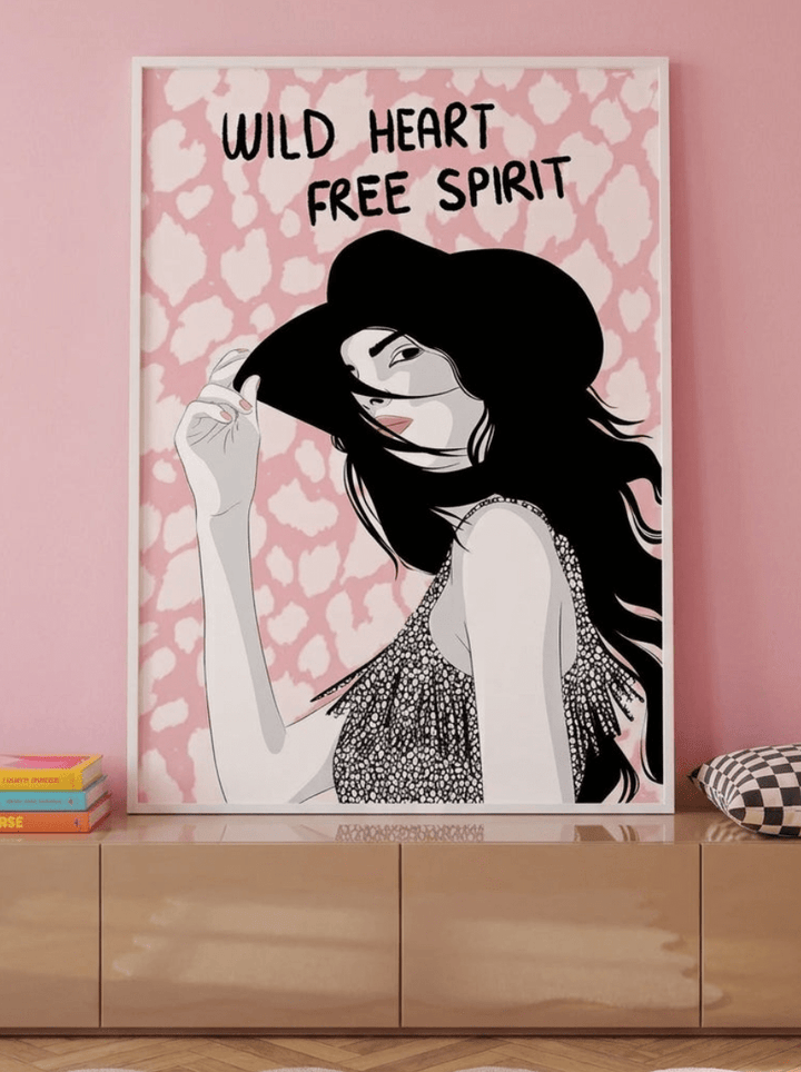 Modern wall art print standing on a sideboard in a colourful eclectic living room